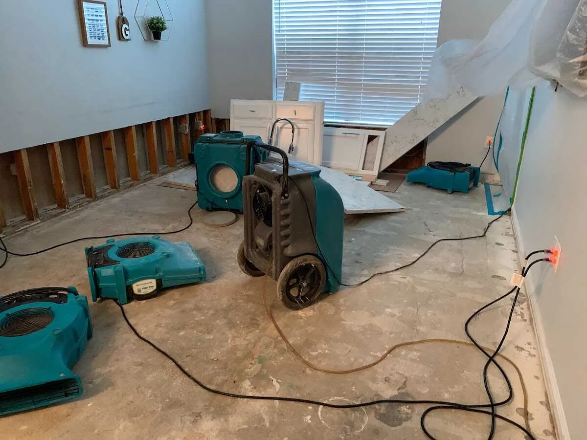 Dehumidifier in flood-cut room for Water Damage Restoration in Sumter